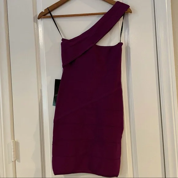 bebe one shoulder bandage dress NWT BEBE SIZE S ONE SHOULDER BANDAGE DRESS Sure to turn heads!! $139
